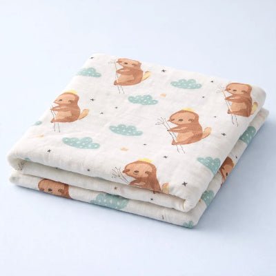 Plaid-_bebe-douce-en-muslin-a-motifs